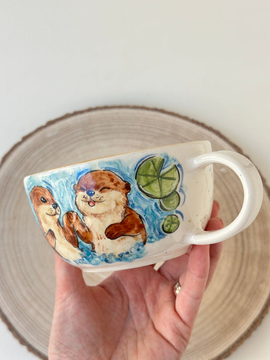 Sea otters handmade mug