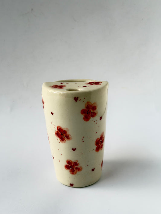 Pink handmade ceramic takeaway mug