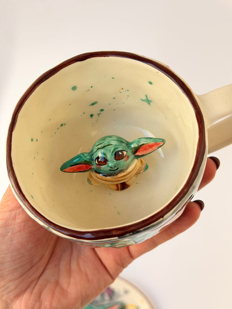 Handmade ceramic coffee cup and plate