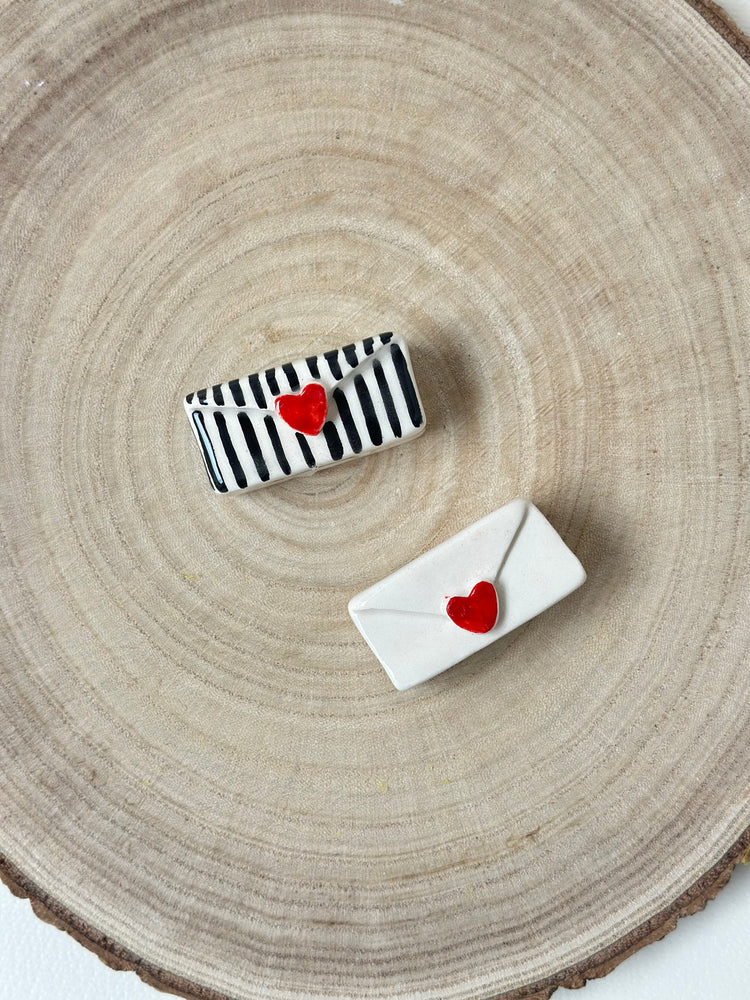 Letter-shaped picture two holders