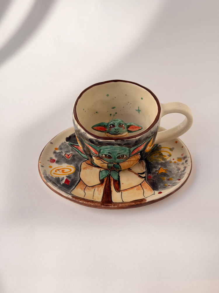 Handmade ceramic coffee cup and plate