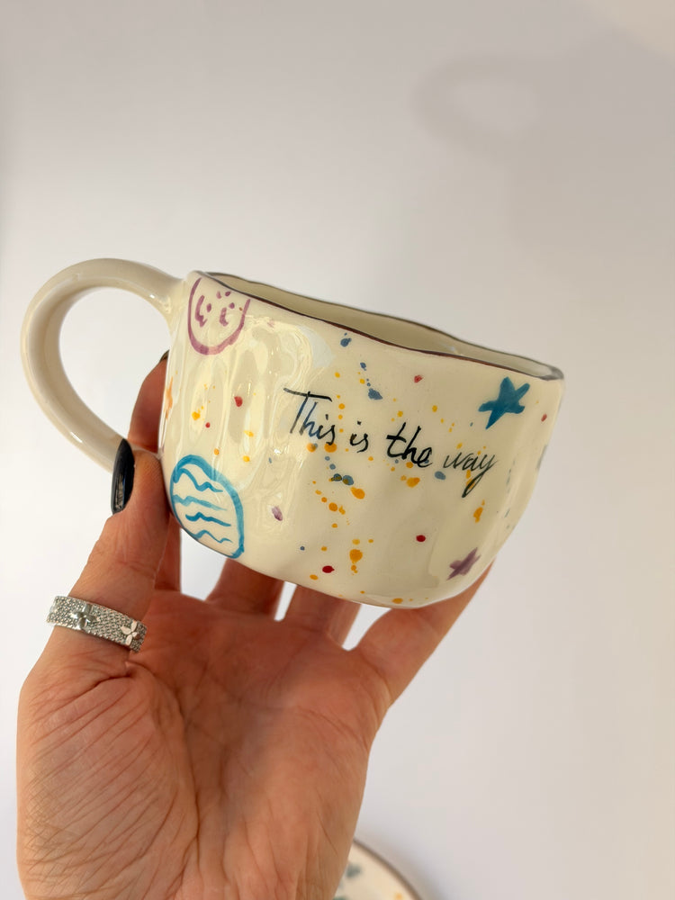 Handmade ceramic coffee cup and plate