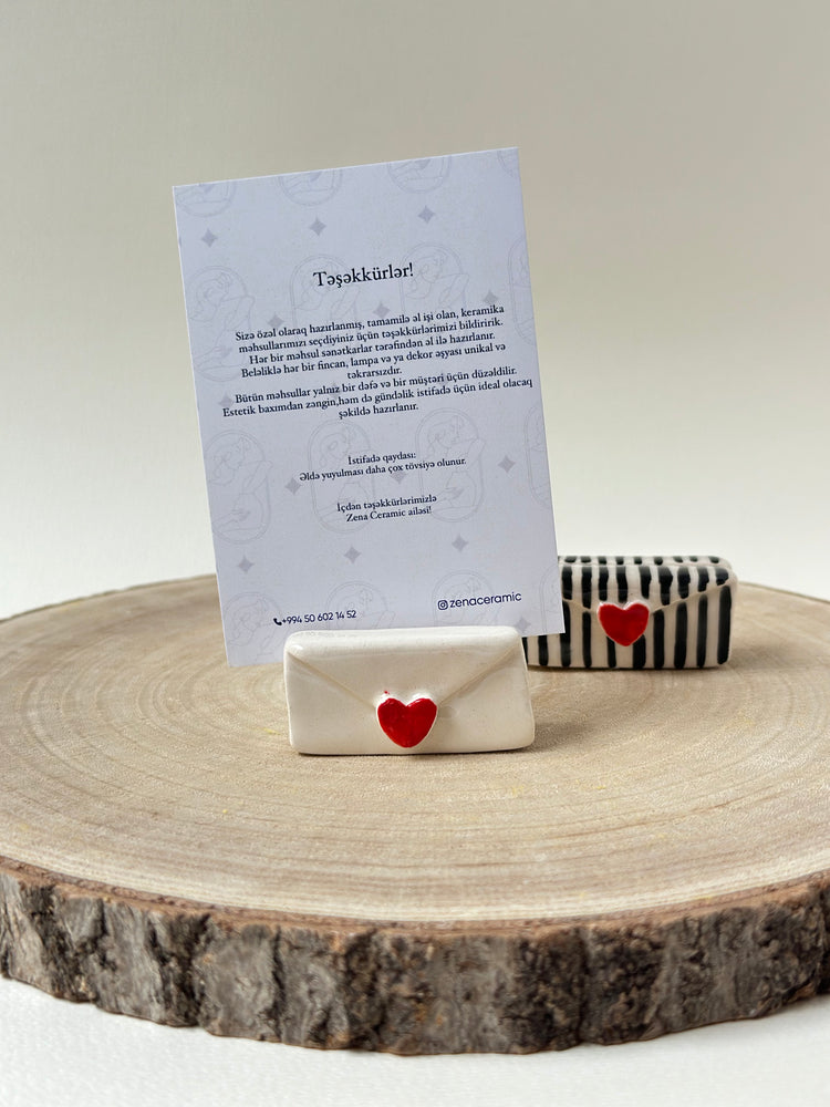 Letter-shaped picture two holders