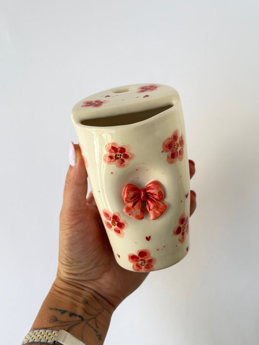 Pink handmade ceramic takeaway mug