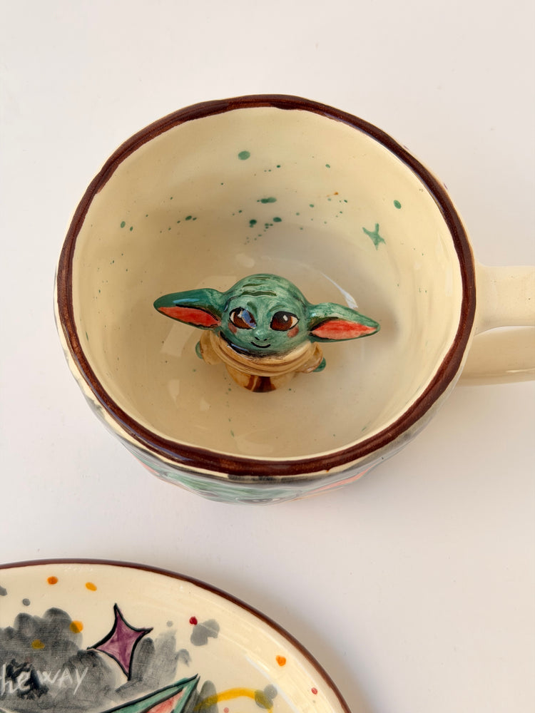 Handmade ceramic coffee cup and plate